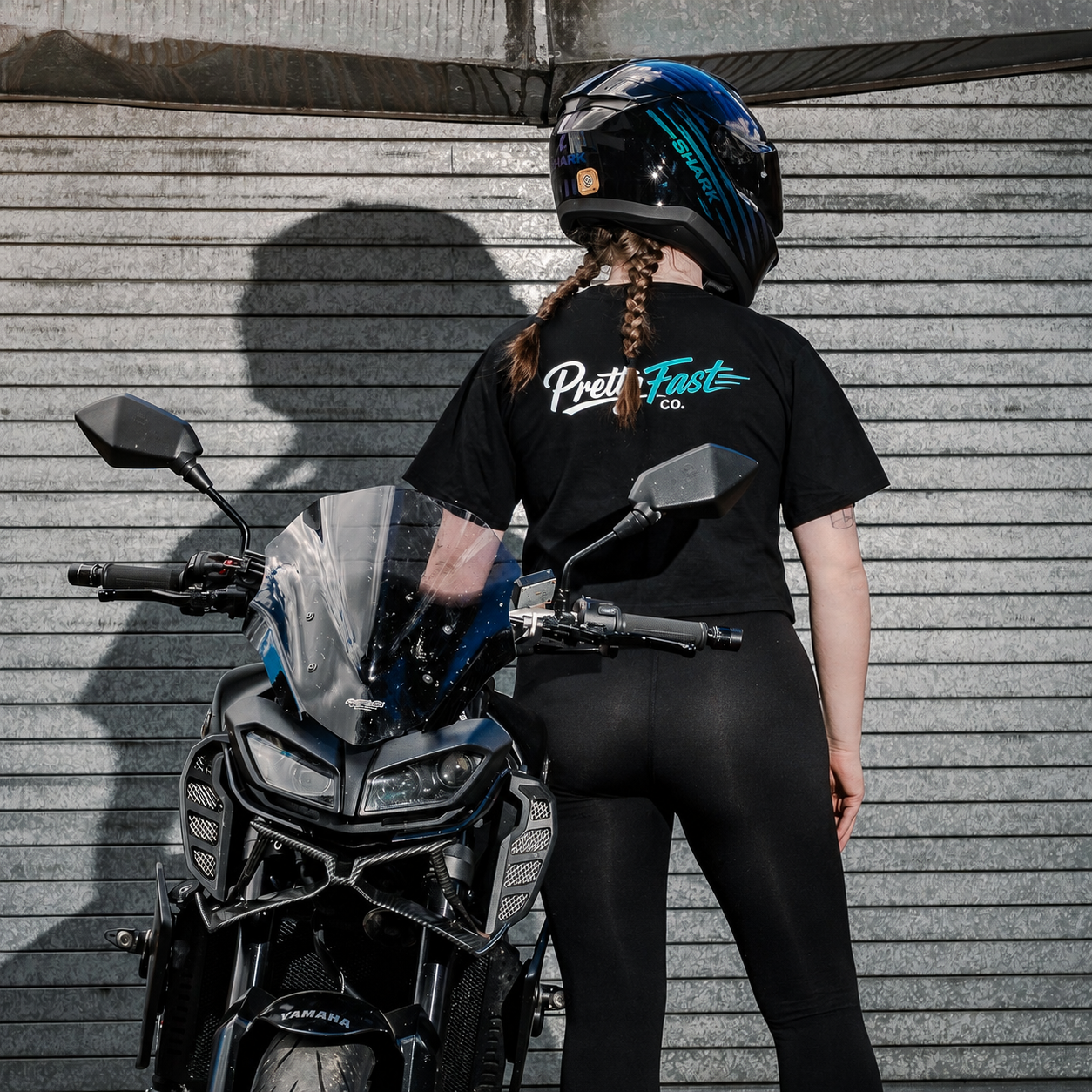 PrettyFastCo Original Cropped Black Tee With Turquoise Logo