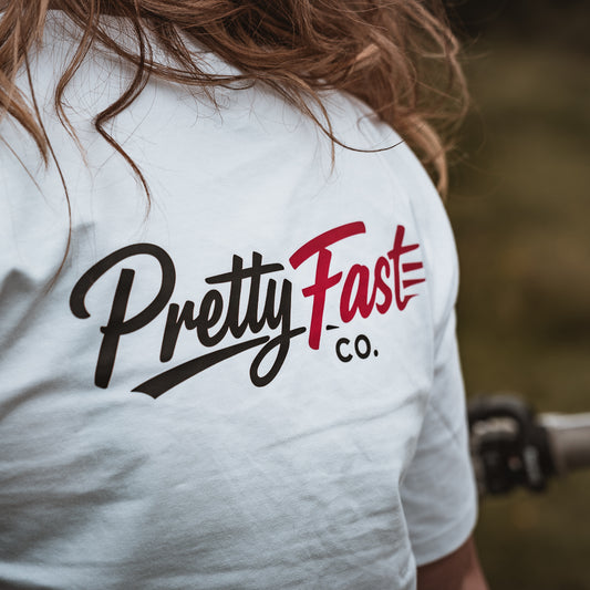 PrettyFastCo Original Cropped White Tee With Pink Logo