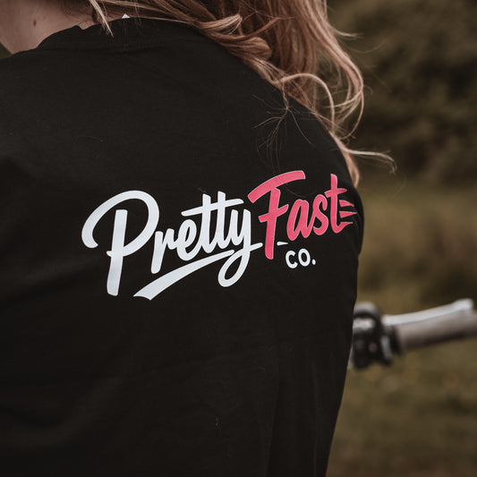 PrettyFastCo Original Cropped Black Tee With Pink Logo