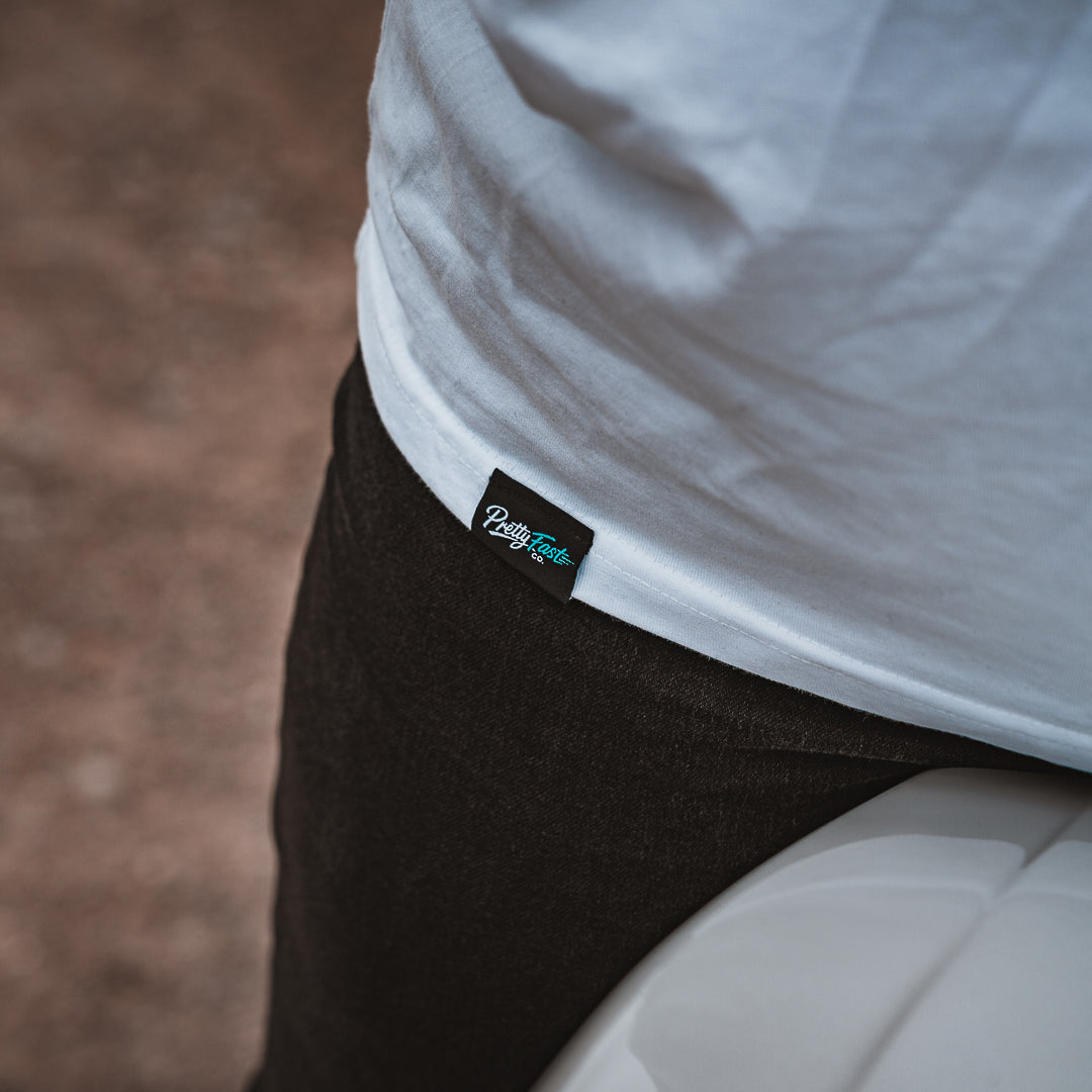 PrettyFastCo Original V-Neck Tee In White With Turquoise Logo