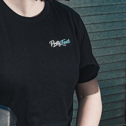 PrettyFastCo Original Cropped Black Tee With Turquoise Logo