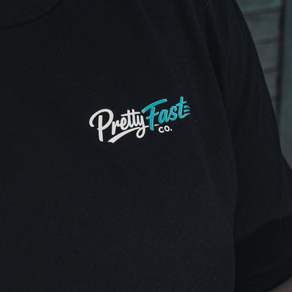 PrettyFastCo Original Cropped Black Tee With Turquoise Logo