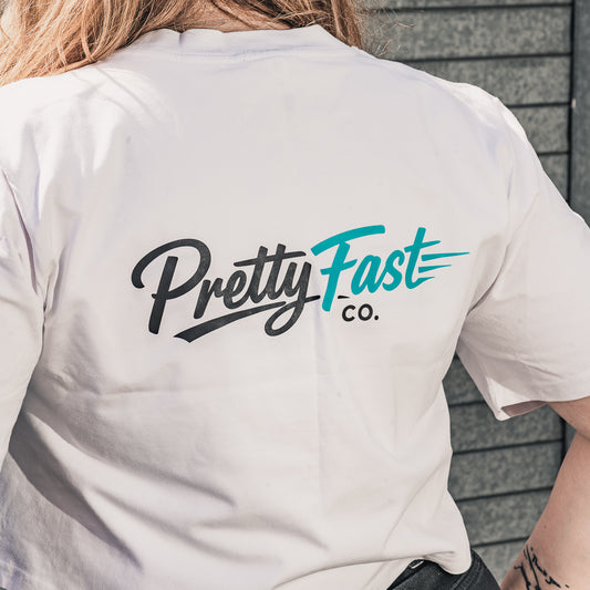 PrettyFastCo Original Cropped White Tee With Turquoise Logo