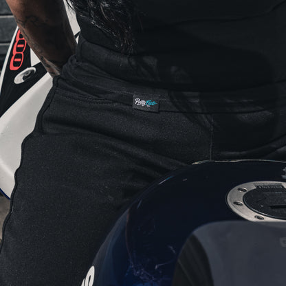 PrettyFastCo Original Vest In Black With Turquoise Logo